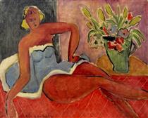 Жінка лежить біля вази з квітами - Анрі Матісс