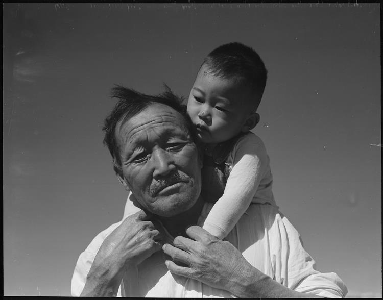 Manzanar Relocation Center, Manzanar, California. Grandfather and Grandson of Japanese Ancestry at This War Relocation Authority Center, 1942 - Dorothea Lange