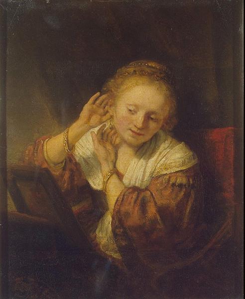 Young Woman Trying Earrings, 1654 - Рембрандт